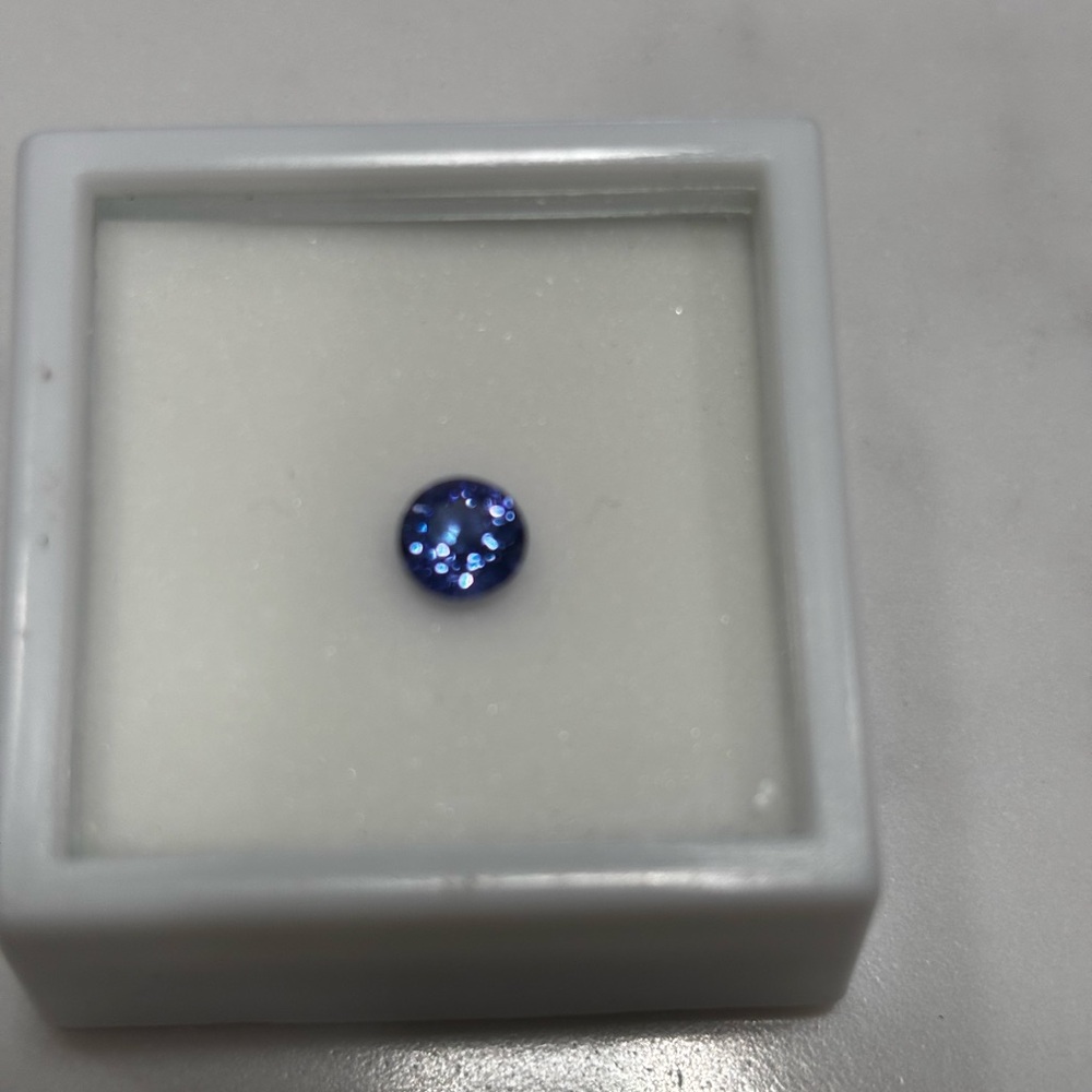 .75CT-Tanzanite-6MM Round - Picture 2 of 7